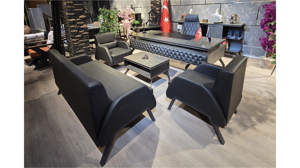 Kapi Trend yönetici masa takımı, kapitoneli ön paneli, mermer desenli tablası ve metal ayakları ile modern ofis ortamında Tilia V serisi bekleme grubu ile sergileniyor. Yeşil, bordo, gri ve kahve renk seçenekleri mevcuttur.